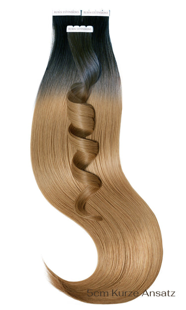 Close-up of Black & Light Brown Caramel tape-in strands with a soft Sombré blend – Rubin Extensions®
