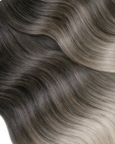 Close-up of Black & Silver Blonde clip-in wefts – Rubin Extensions®