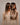 Back view of model with Dirty Blonde clip-in human hair extensions – Rubin Extensions®