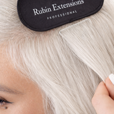 Close-up of Natural Golden Brown strands, tape-in technique – Rubin Extensions®